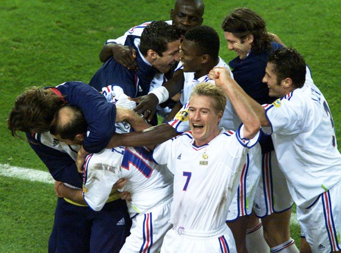 French team captain Didier Deschamps (7) celebrates with teammates after victory against Portugal in their European Championship semi-final match in Brussels June 28, 2000