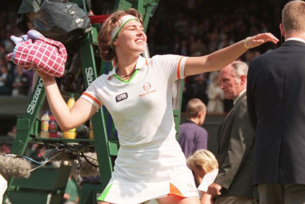 Switzerland's Martina Hingis celebrates her victory at the 1997 Wimbledon Championships
