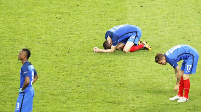 France's Andre-Pierre Gignac, Lucas Digne and Patrice Evra are a dejected lot after the Euro final