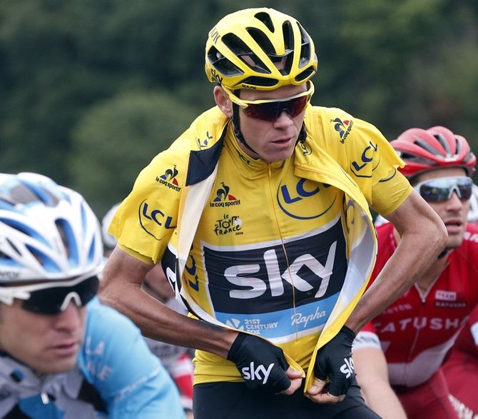 Yellow jersey leader Team Sky rider Chris Froome of Britain rides during the race