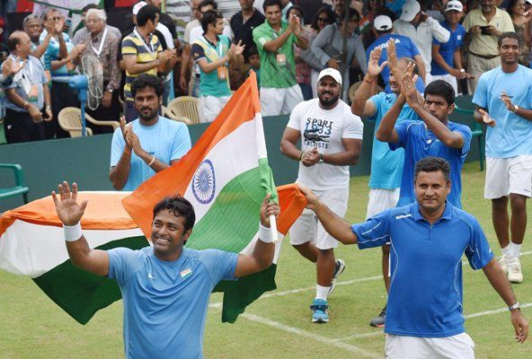 India's Leander Paes and Rohan Bopanna acknowledge the crowd after winning 3-0 against Korea during the Asia/Oceania Group I Davis Cup match
