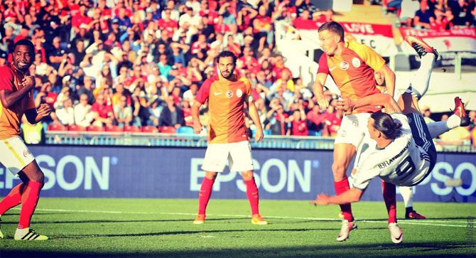 Manchester United debutant Zlatan Ibrahimovic scores through a scissor kick during their friendly against Turkish club Galatasray on Saturday