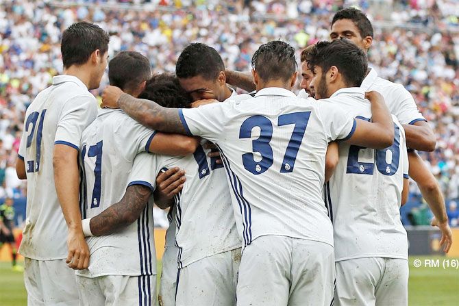 Real Madrid players celebrate after scoring against Chelsea in Michigan on Saturday