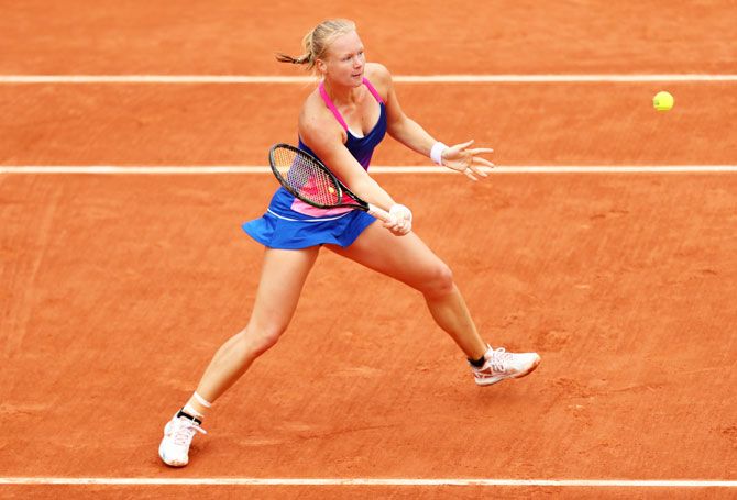 Netherlands' Kiki Bertens plays a volleys during her fourth round match against USA's Madison Keys