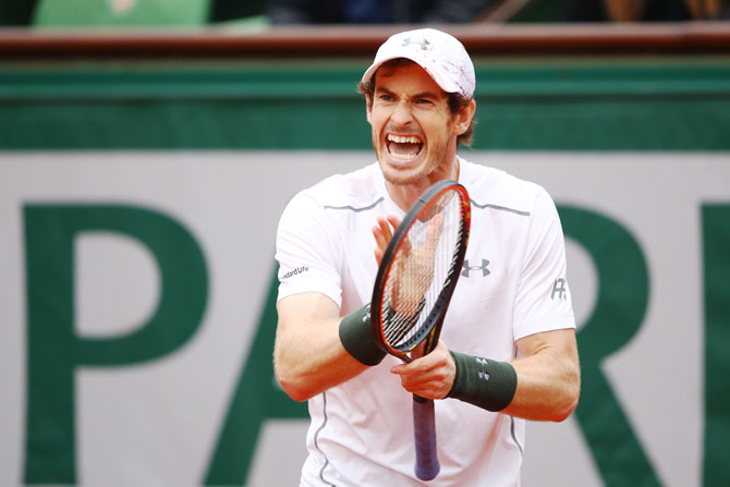 Britain's Andy Murray reacts during his French Open quarter-final match against Frenchman Richard Gasquet at Roland Garros in Paris on Wednesday