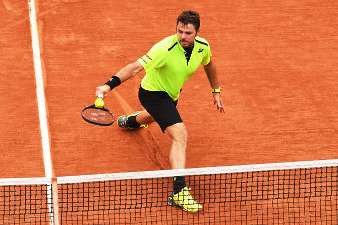 Switzerland's Stan Wawrinka hits a backhand during his quarter-final match against Spain's Alberto Ramos Vinolas