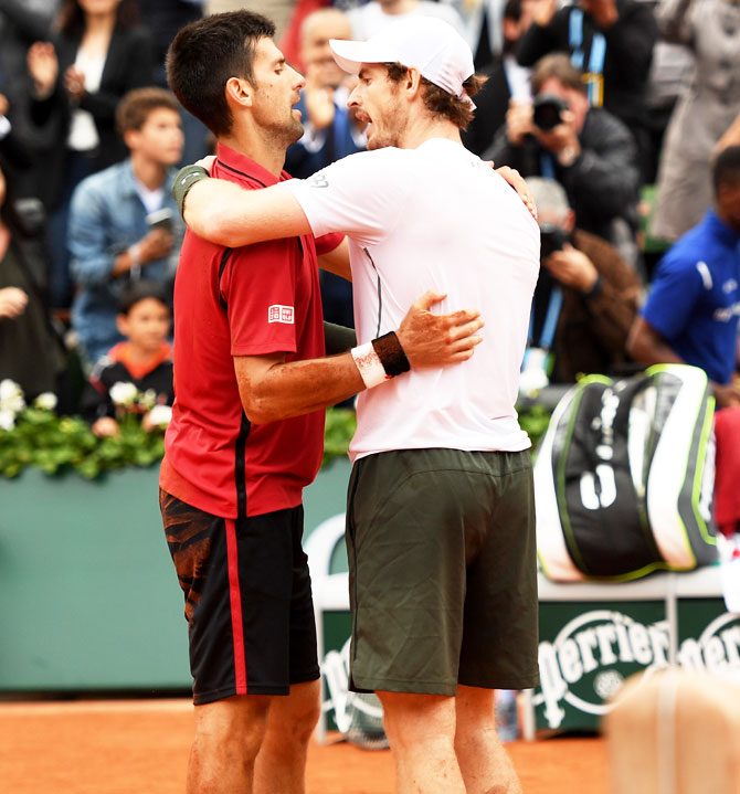 Champion Novak Djokovic and runner-up Andy Murray greet each other at the net following the French Open final on Sunday