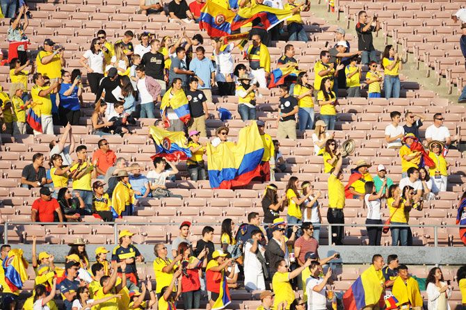 Colombia fans in attendance cheer before the group game against Paraguay at the 2016 Copa America Centenario at Rose Bowl Stadium in Pasadena on Monday. Reports have suggested that the US-hosted tournament is not drawing too many fans to the stadium
