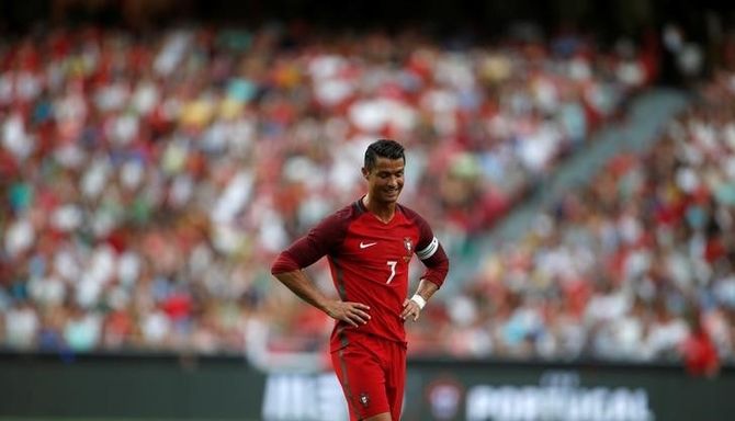 Ronaldo urges Portugal to stay grounded after Estonia romp - Rediff Sports