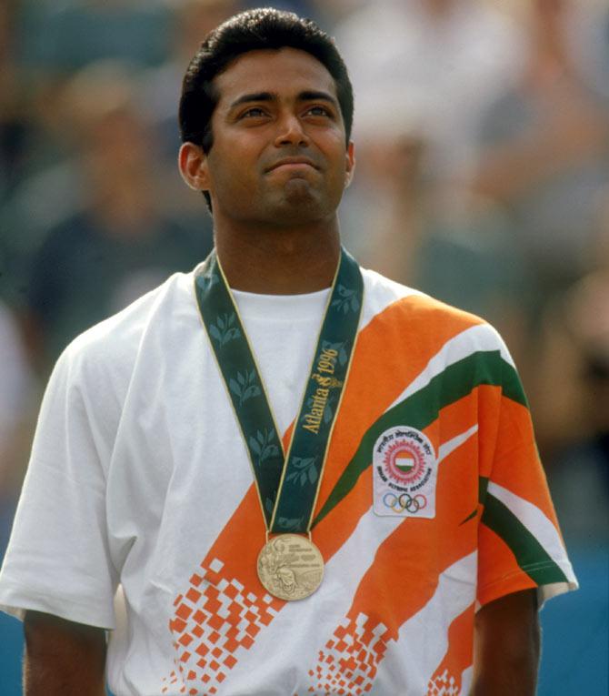 Leander Paes stands on the podium after winning the bronze medal in the men's singles tennis event at the 1996 Olympics in Atlanta on August 3, 1996. Photograph: Gary M Prior/Getty Images