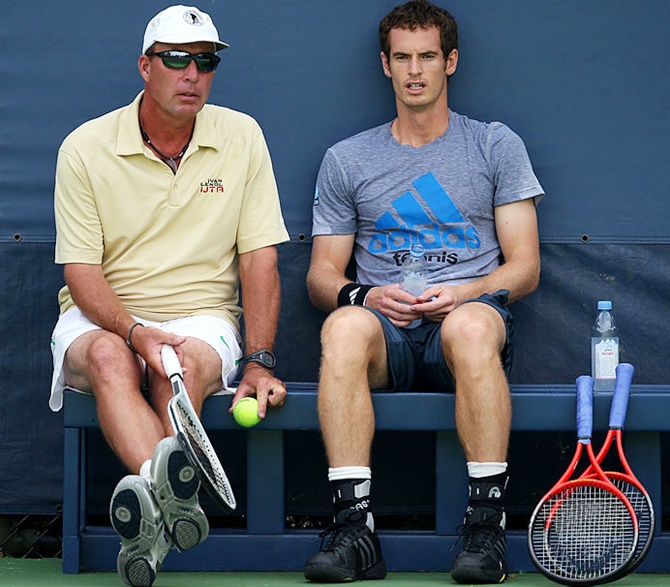 Andy Murray of Great Britain speaks with his coach Ivan Lendl