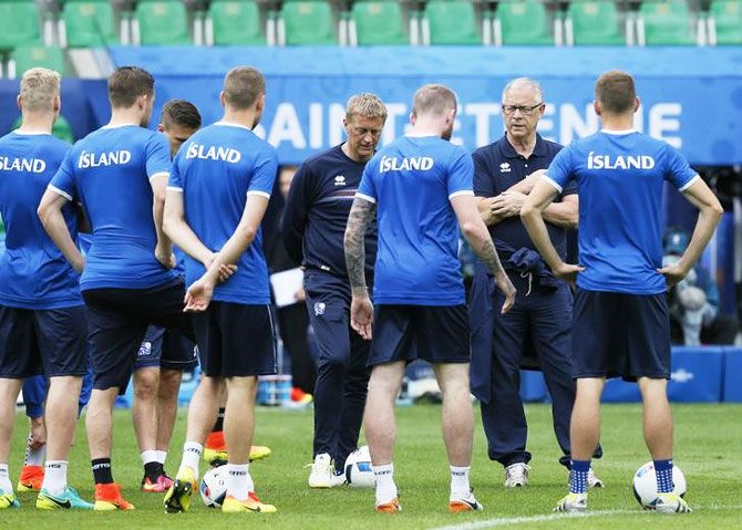 Iceland's coaches Lars Lagerback (2nd from left) and Heimir Hallgrimsson (4th from left) during a training