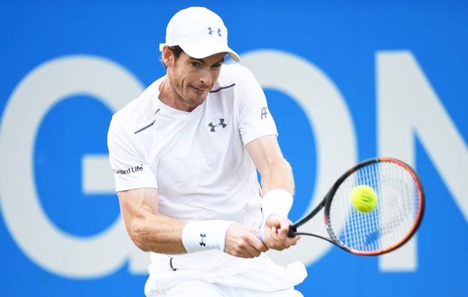 Britain's Andy Murray in action during the first round match at the Queens Aegon Championships in London on Tuesday