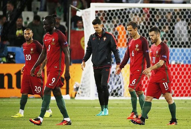 Portugal's Ricardo Quaresma, Eder, Jose Fonte, Ricardo Carvalho and Vieirinha look dejected at the end of the match
