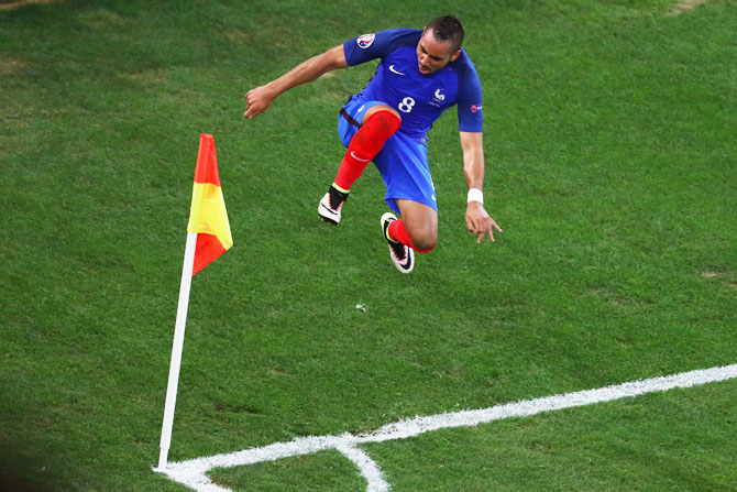 France's Dimitri Payet celebrates after scoring his team's second goal against Albania during their Euro 2016 Group A match at Stade Velodrome in Marseille on June 15