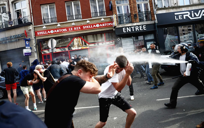  England football fans clash with police in Lille on Wednesday