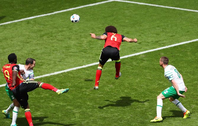 Belgium's Axel Witsel heads to score his team's second goal against Ireland