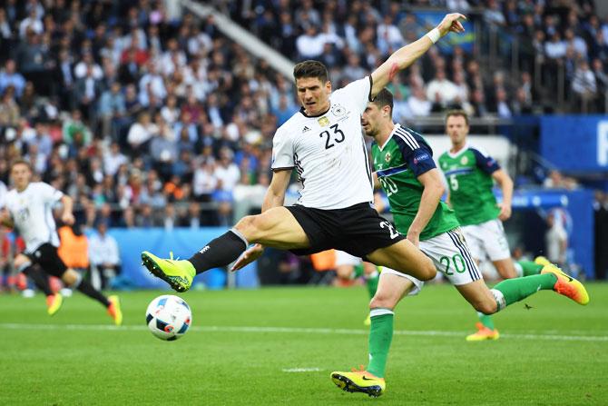 Germany's Mario Gomez stretches for the ball during the Euro 2016 Group C match against Northern Ireland Parc des Princes in Paris, on Tuesday