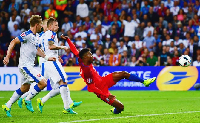 England's Daniel Sturridge attempts a shot at goal during their Euro 2016 Group B match against Slovakia at Stade Geoffroy-Guichard in Saint-Etienne, on Monday