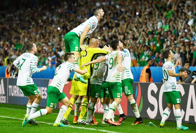 Republic of Ireland players celebrate their team's 1-0 win after their Euro 2016 Group E match against Italy at Stade Pierre-Mauroy in Lille on Wednesday