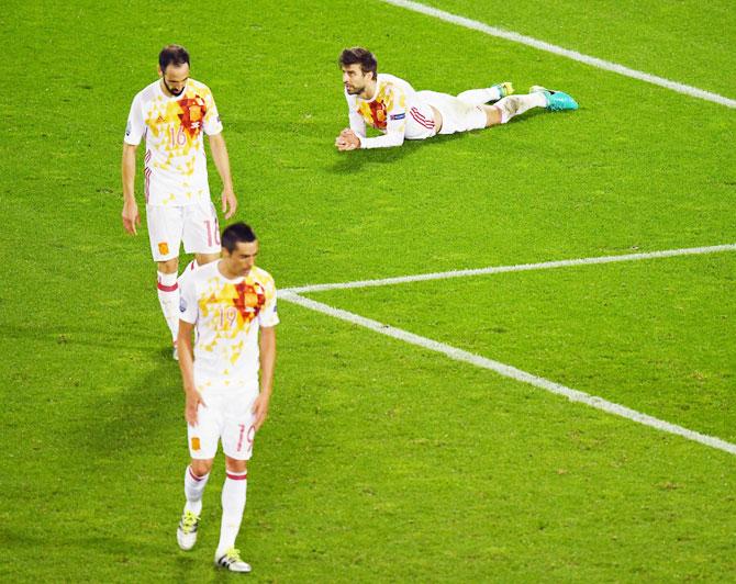 Spain's Bruno Soriano, Juanfran and Gerard Pique