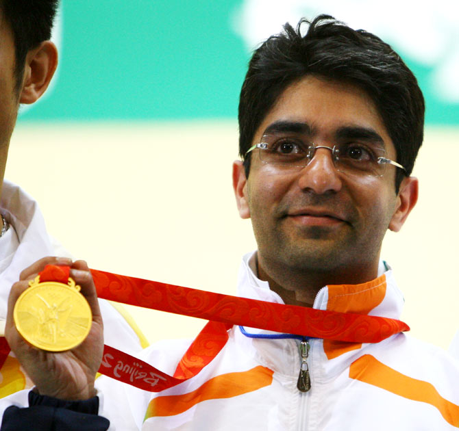 Abhinav Bindra of India poses with his gold medal in the Men's 10m Air Rifle Final at the Beijing 2008 Olympic Games on August 11, 2008
