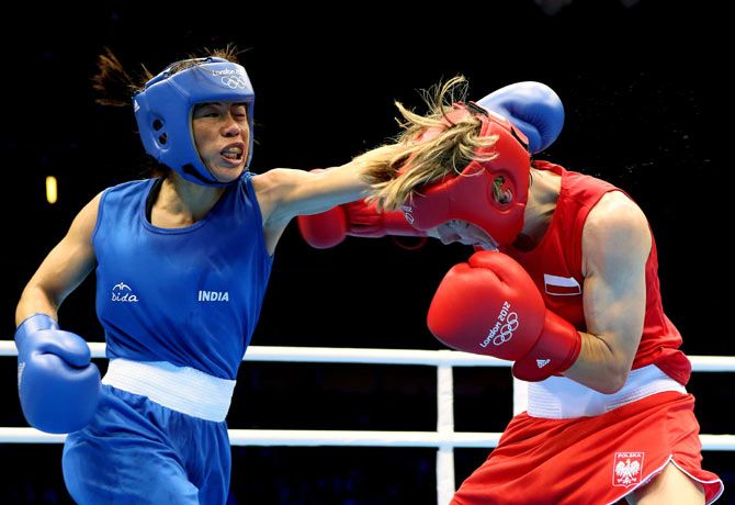 MC Mary Kom, left, in action against Karolina Michalczuk of Poland at the 2012 Olympic Games in London