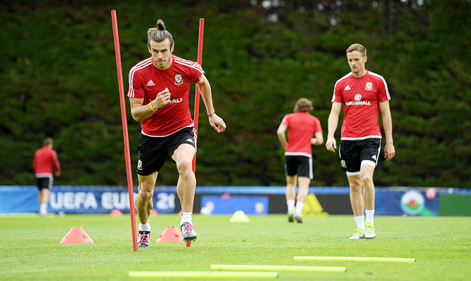 Wales' Gareth Bale goes through the grind during a team training session at their Euro 2016 base camp in Dinard, France, ahead of their quarter-final match against Belguim, on Tuesday