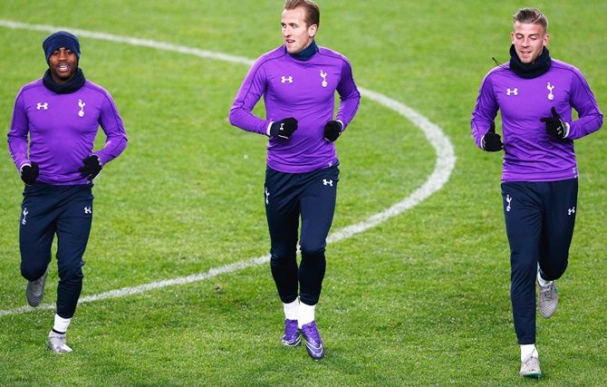  From left, Danny Rose, Harry Kane and Toby Alderweireld warm up during the Tottenham Hotspur training session