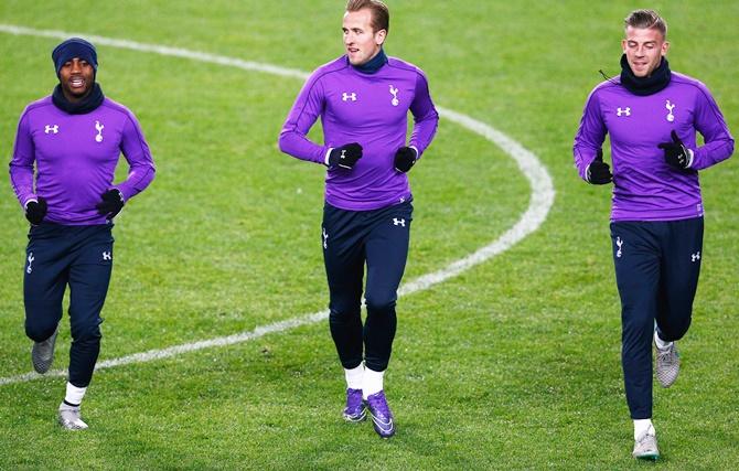  From left, Danny Rose, Harry Kane and Toby Alderweireld warm up during the Tottenham Hotspur training session