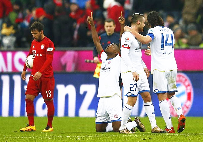 Mainz 05's Jhon Cordoba celebrates netting the winning goal against Bayern Munich during their Bundeliga match at Allianz-Arena, in Munich, on Wednesday