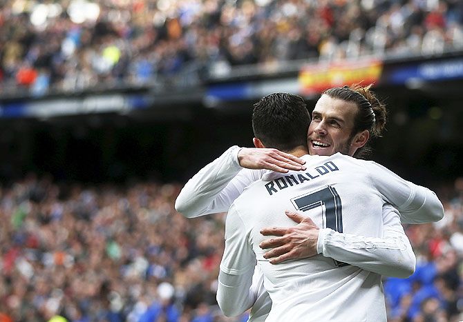 Real Madrid's Gareth Bale celebrates his goal against Celta Vigo with teammate Cristiano Ronaldo
