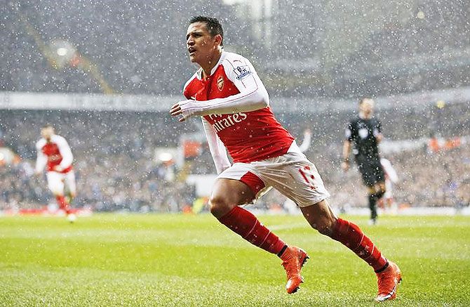Arsenal's Alexis Sanchez celebrates after scoring the equaliser against Tottenham Hotspur at White Hart Lane on Saturday