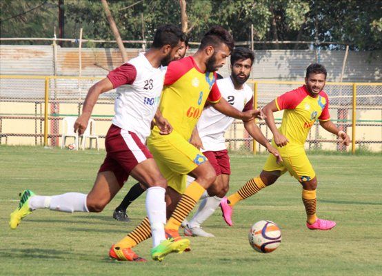 Players of Goa (in yellow) and Punjab in action during at 70th National Football Championship, for the Santosh Trophy, in Nagpur.