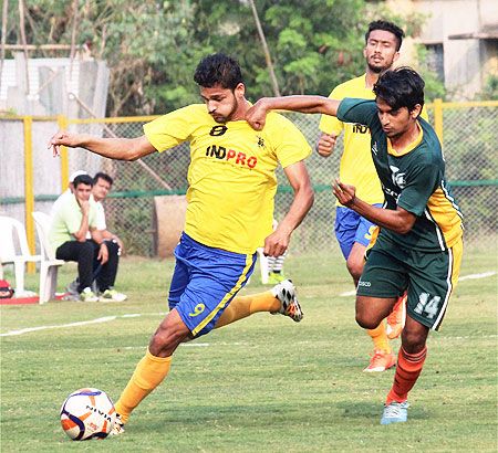 Players of Punjab (in yellow) and Tamil Nadu in action during their match at the 70th Santosh Trophy National Football Championship in Nagpur on Wednesday 