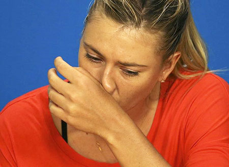 Russia's Maria Sharapova reacts during a news conference