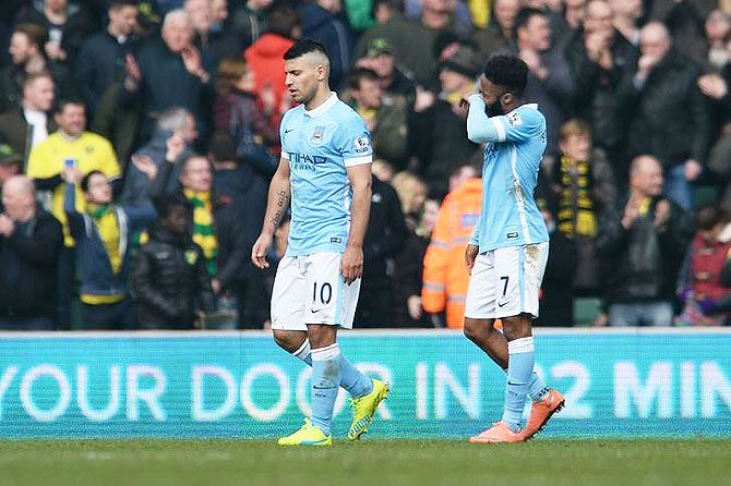 Manchester City's Sergio Aguero and Raheem Sterling look dejected after the game