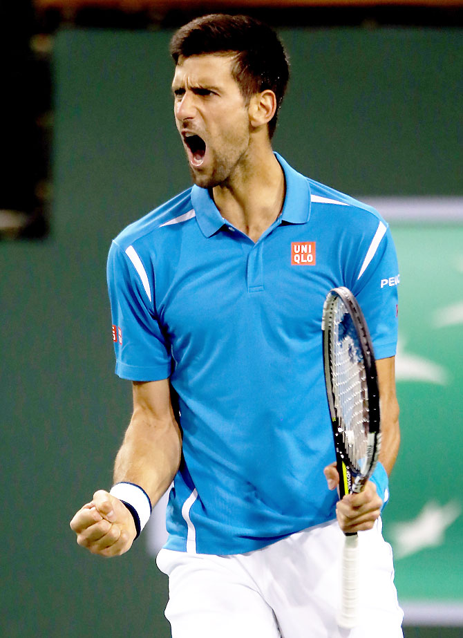 Serbia's Novak Djokovic celebrates match point against Germany's Philipp Kohlschreiber during the BNP Paribas Open at the Indian Wells Tennis Garden in Indian Wells, California, on Tuesday