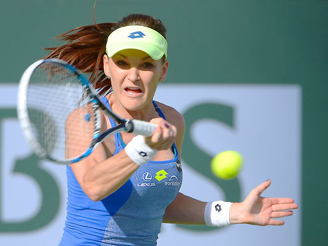 Poland's Agnieska Radwanska in action against Dominika Cibulkova