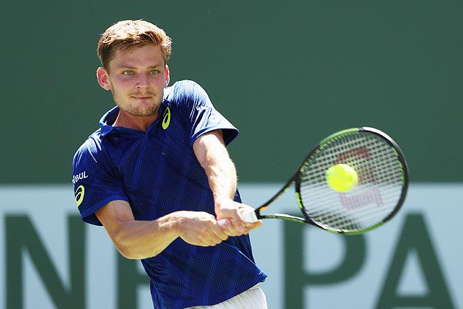 Belgium's David Goffin in action against Switzerland's Stan Wawrinka