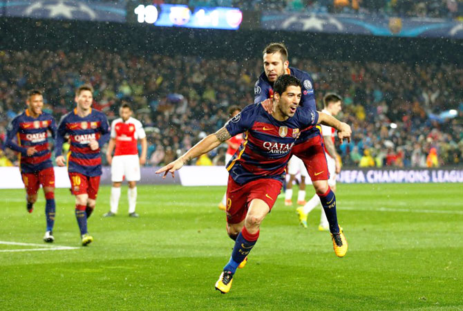 Luis Suarez celebrates with Jordi Alba after scoring Barcelona's second goal