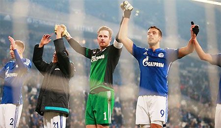Schalke players celebrate after their 2-1 win against Borussia Moenchengladbach on Friday