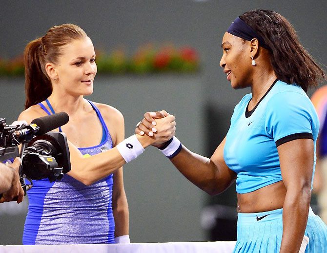 Serena Williams shakes hands with Agnieszka Radwanska after their semi-final match