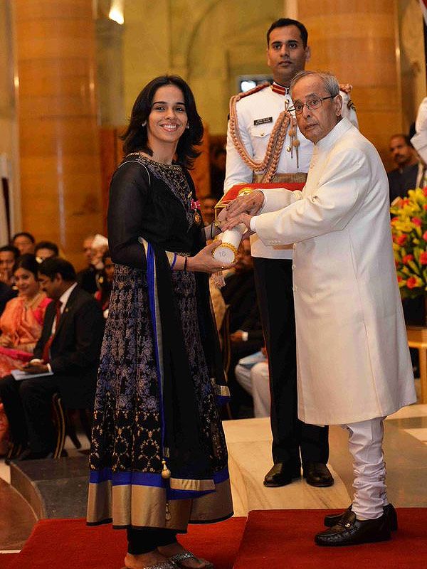 Saina Nehwal receives the Padma Bhushan from President Pranab Mukherjee