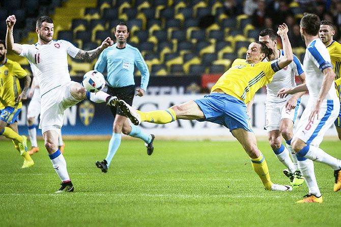 Czech Republic's Daniel Pudil (left) fights for the ball with Sweden's Zlatan Ibrahimovic during their friendly soccer match at the Friends Arena in Stockholm, Sweden