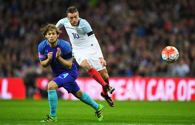 England's Jamie Vardy fires in a shot on goal past Netherlands' Daley Blind