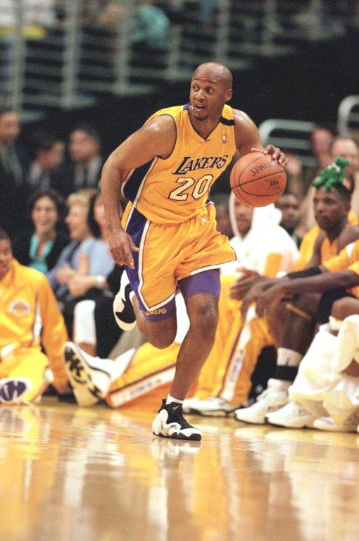 Brian Shaw #20 of the Los Angeles Lakers dribbles down the court during the NBA Western Conference Playoffs Round One Game against the Sacramento Kings at the Staples Center in Los Angeles, California