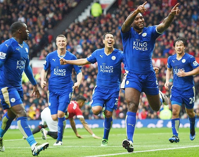Wes Morgan of Leicester City celebrates scoring his team's goal with team-mates during the Premier League match against Manchester United