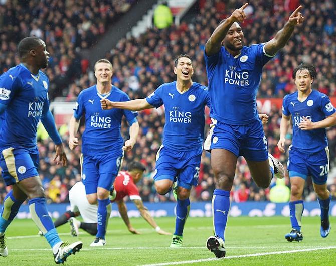 Wes Morgan of Leicester City celebrates scoring his team's goal with team-mates during the Premier League match against Manchester United