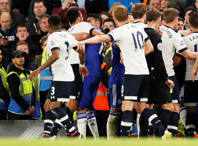 Chelsea's Diego Costa clashes with Tottenham's Mousa Dembele after their English Premier League match on Monday